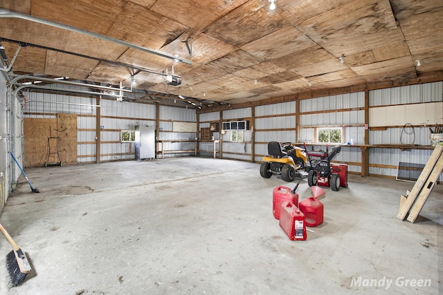 4651 E Pierce Rd, Ithaca, MI 48847 - garage featuring a garage door opener