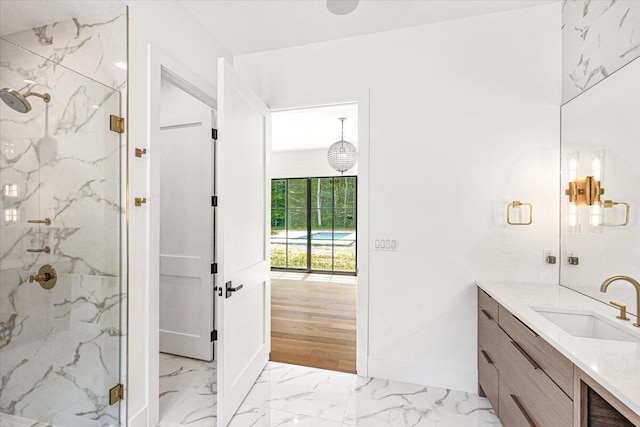 7462 Youngren Rd, Three Oaks, MI 49128 - full bath with a marble finish shower, vanity, and marble finish flooring