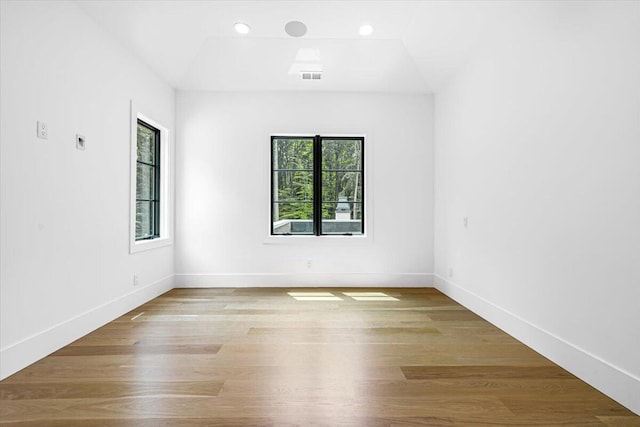 7462 Youngren Rd, Three Oaks, MI 49128 - empty room featuring light wood-type flooring and recessed lighting
