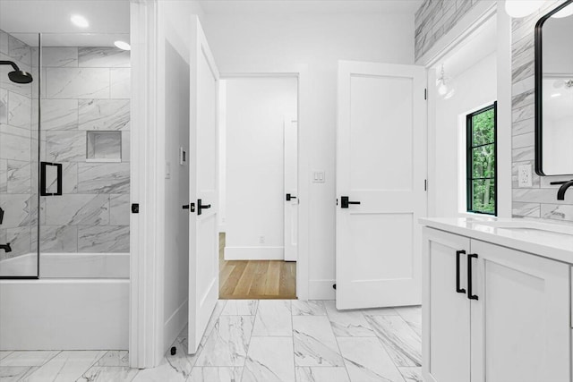 7462 Youngren Rd, Three Oaks, MI 49128 - full bathroom with marble finish flooring, vanity, enclosed tub / shower combo, and recessed lighting