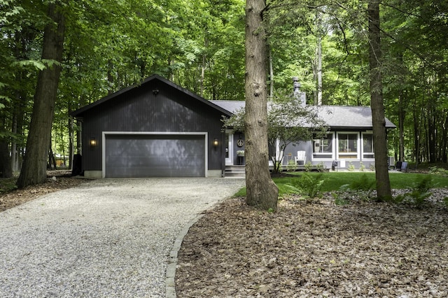 1227 Beech Dr, South Haven, MI 49090 - view of front of house with driveway and an attached garage
