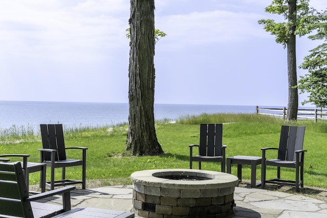 1227 Beech Dr, South Haven, MI 49090 - view of patio featuring an outdoor fire pit and a water view