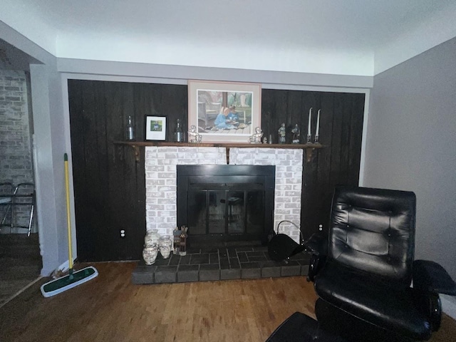 4518 Huckleberry Ln, Flint, MI 48507 - detailed view of wood finished floors and a fireplace