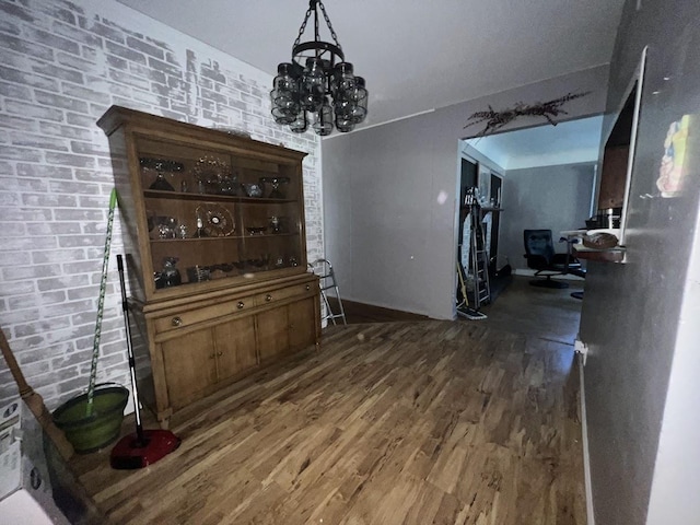 4518 Huckleberry Ln, Flint, MI 48507 - dining room with wood finished floors and a chandelier