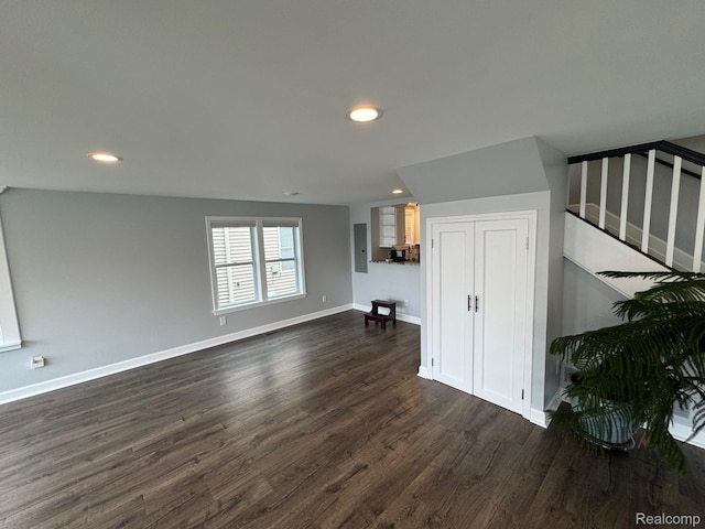 677 King Cir, Lake Orion, MI 48362 - living area with dark wood-type flooring, recessed lighting, and electric panel