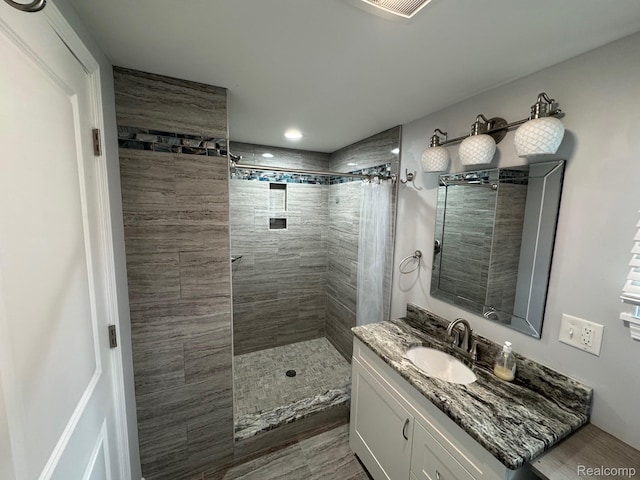 677 King Cir, Lake Orion, MI 48362 - full bath with tiled shower and vanity