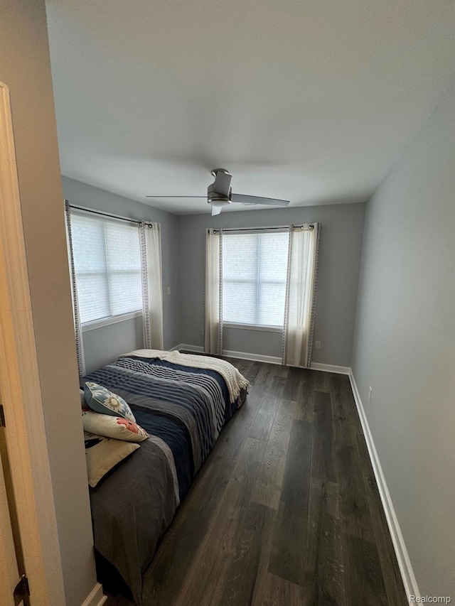 677 King Cir, Lake Orion, MI 48362 - bedroom featuring dark wood-style floors and ceiling fan