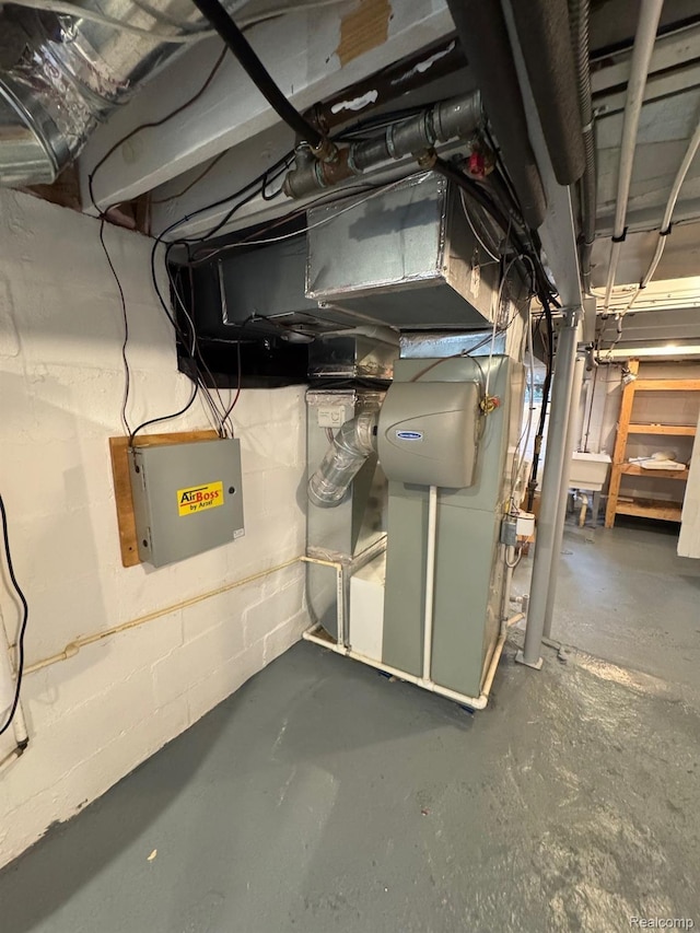 677 King Cir, Lake Orion, MI 48362 - unfinished below grade area featuring heating unit