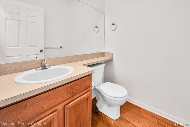 1236 University Dr, Pontiac, MI 48342 - bathroom featuring vanity and wood finished floors