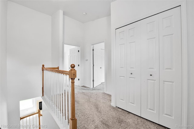 1236 University Dr, Pontiac, MI 48342 - hallway featuring carpet floors and an upstairs landing
