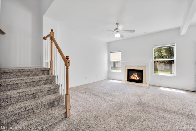1236 University Dr, Pontiac, MI 48342 - unfurnished living room with ceiling fan, carpet, stairs, and a fireplace with flush hearth