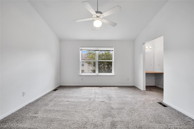 1236 University Dr, Pontiac, MI 48342 - unfurnished bedroom featuring carpet, vaulted ceiling, and ceiling fan