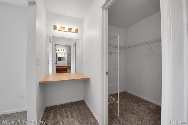1236 University Dr, Pontiac, MI 48342 - spacious closet featuring carpet floors and built in desk