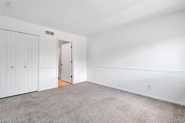1236 University Dr, Pontiac, MI 48342 - unfurnished bedroom featuring carpet floors and a closet
