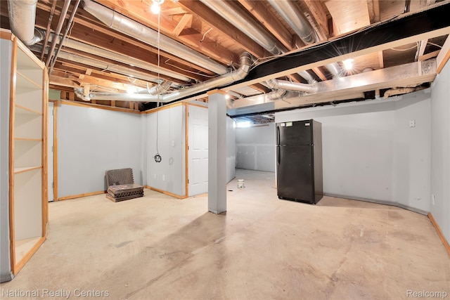 1236 University Dr, Pontiac, MI 48342 - unfinished basement with freestanding refrigerator