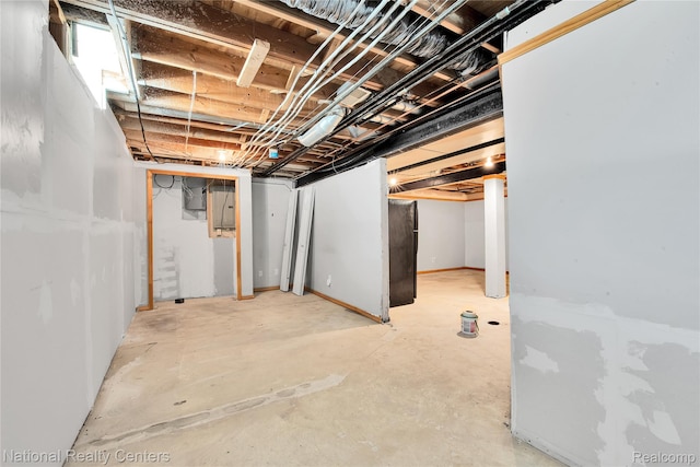 1236 University Dr, Pontiac, MI 48342 - unfinished basement with freestanding refrigerator and electric panel