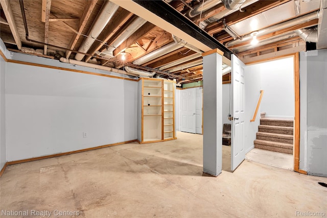 1236 University Dr, Pontiac, MI 48342 - unfinished below grade area with stairway and baseboards