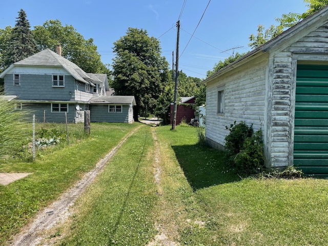 262 5th St, Manistee, MI 49660 - view of green lawn