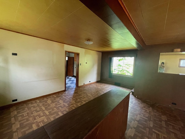 262 5th St, Manistee, MI 49660 - spare room featuring baseboards