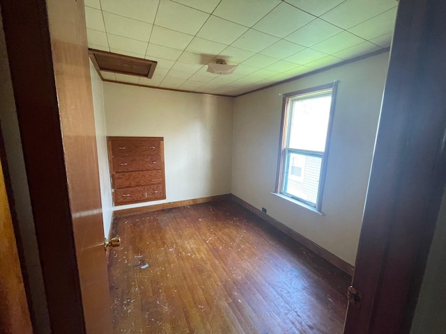 262 5th St, Manistee, MI 49660 - spare room featuring hardwood / wood-style floors and baseboards