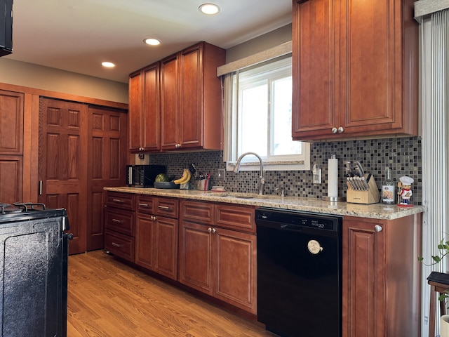 39909 Bridgeview St, Harrison Township, MI 48045 - kitchen featuring black dishwasher, decorative backsplash, light wood-style flooring, stove, and recessed lighting