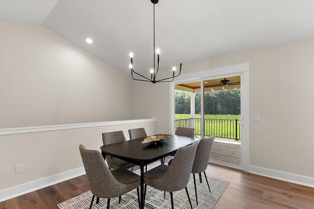 6766 Baldwin St, Hudsonville, MI 49426 - dining space featuring wood finished floors, lofted ceiling, a chandelier, and recessed lighting