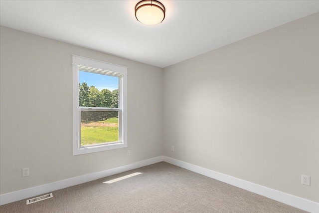 6766 Baldwin St, Hudsonville, MI 49426 - carpeted empty room featuring baseboards
