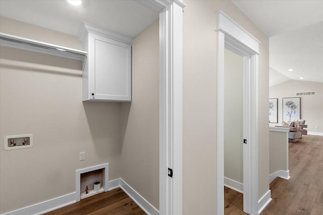 6766 Baldwin St, Hudsonville, MI 49426 - laundry area with hookup for a washing machine, wood finished floors, cabinet space, and recessed lighting