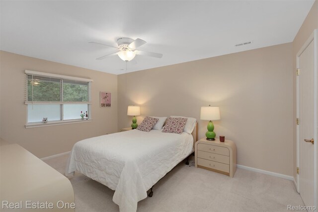 1127 S Lake Dr Unit 212, Novi, MI 48377 - bedroom featuring carpet floors and a ceiling fan