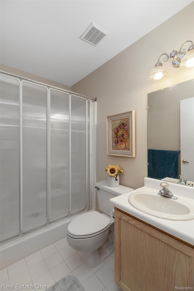 1127 S Lake Dr Unit 212, Novi, MI 48377 - bathroom with vanity, tile patterned floors, and a shower with shower door