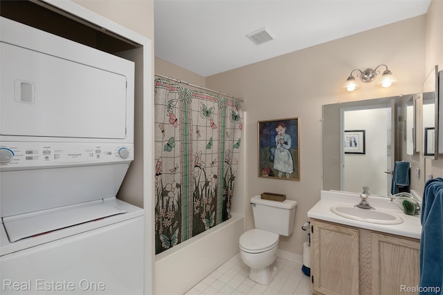 1127 S Lake Dr Unit 212, Novi, MI 48377 - full bath featuring stacked washer and clothes dryer, vanity, tile patterned floors, and shower / bath combination with curtain
