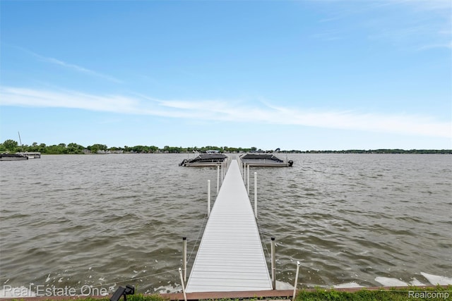1127 S Lake Dr Unit 212, Novi, MI 48377 - dock featuring a water view