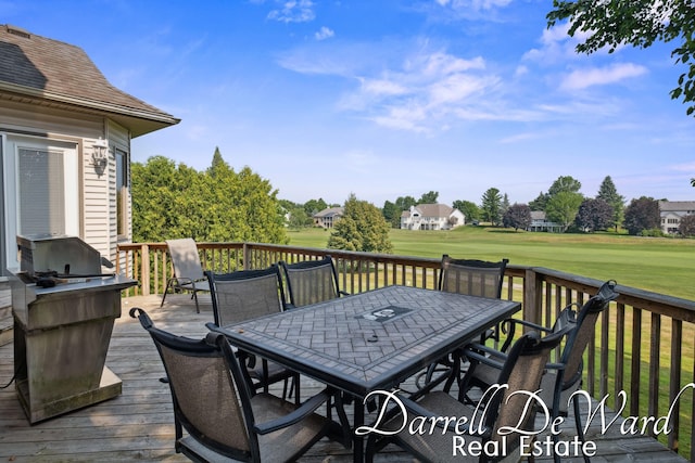 2711 Byron Station Dr SW, Byron Center, MI 49315 - wooden terrace featuring outdoor dining space, area for grilling, a yard, and golf course view
