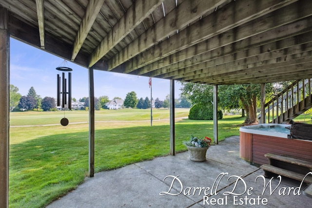 2711 Byron Station Dr SW, Byron Center, MI 49315 - view of patio / terrace featuring a hot tub and golf course view