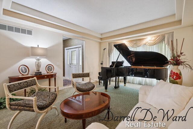 2711 Byron Station Dr SW, Byron Center, MI 49315 - living area with carpet floors and a tray ceiling
