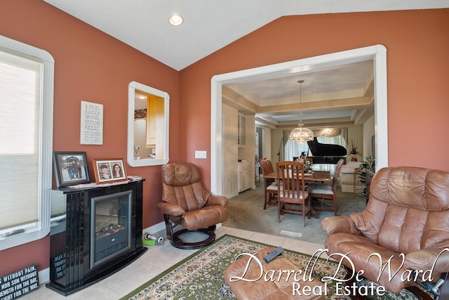 2711 Byron Station Dr SW, Byron Center, MI 49315 - tiled living area featuring a chandelier, healthy amount of natural light, lofted ceiling, and recessed lighting