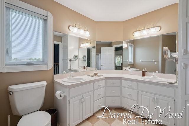2711 Byron Station Dr SW, Byron Center, MI 49315 - full bathroom featuring double vanity and tile patterned flooring