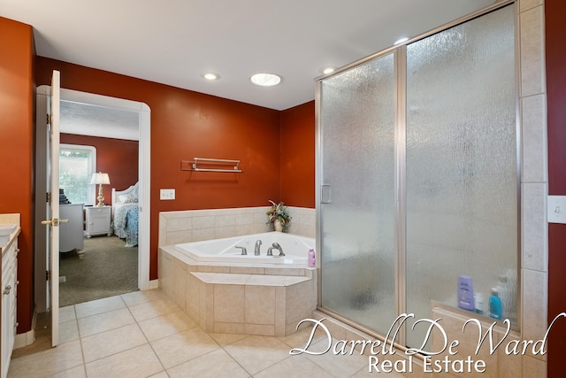 2711 Byron Station Dr SW, Byron Center, MI 49315 - ensuite bathroom featuring vanity, a garden tub, tile patterned flooring, and a shower stall