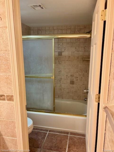 2120 Pauline Blvd Unit 305, Ann Arbor, MI 48103 - bathroom with bath / shower combo with glass door and tile patterned flooring
