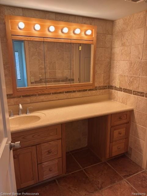 2120 Pauline Blvd Unit 305, Ann Arbor, MI 48103 - bathroom with vanity, tile patterned flooring, and tile walls