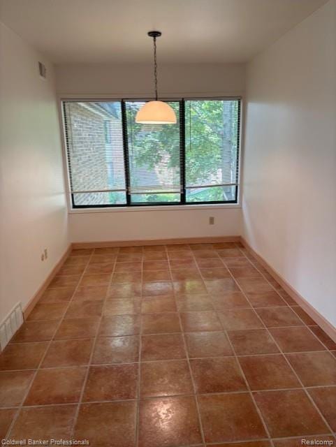 2120 Pauline Blvd Unit 305, Ann Arbor, MI 48103 - unfurnished dining area with baseboards