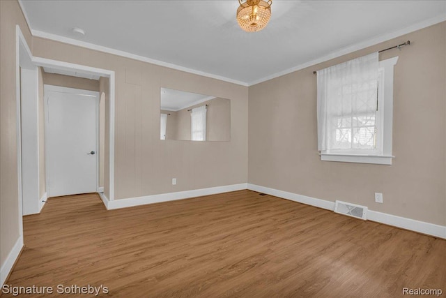 1221 E 13 Mile Rd, Royal Oak, MI 48073 - unfurnished room with ornamental molding and wood finished floors