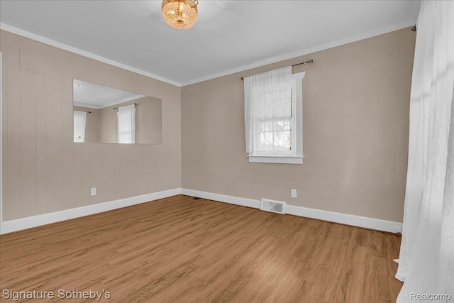 1221 E 13 Mile Rd, Royal Oak, MI 48073 - unfurnished room with wood finished floors and crown molding
