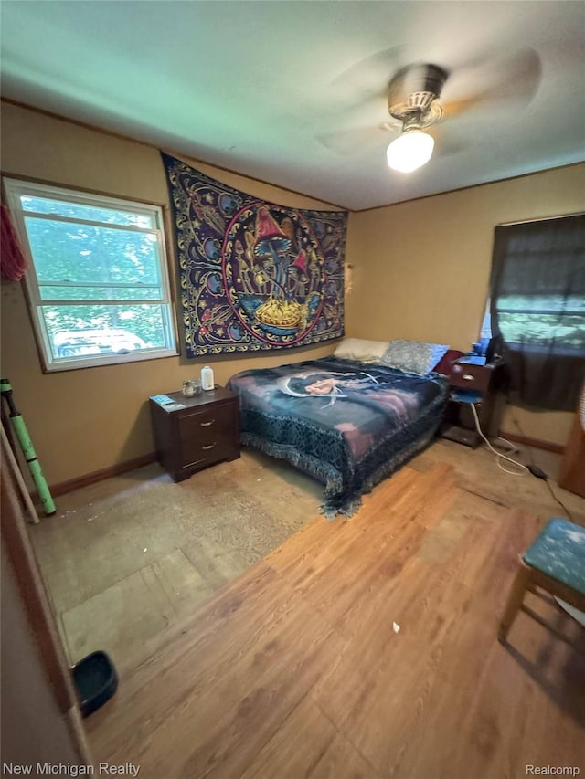 5407 Ostrom Rd, Attica, MI 48412 - bedroom featuring ceiling fan and wood finished floors