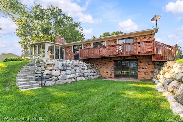 1830 Majon, Highland, MI 48356 - rear view of house featuring a sunroom, brick siding, and a lawn