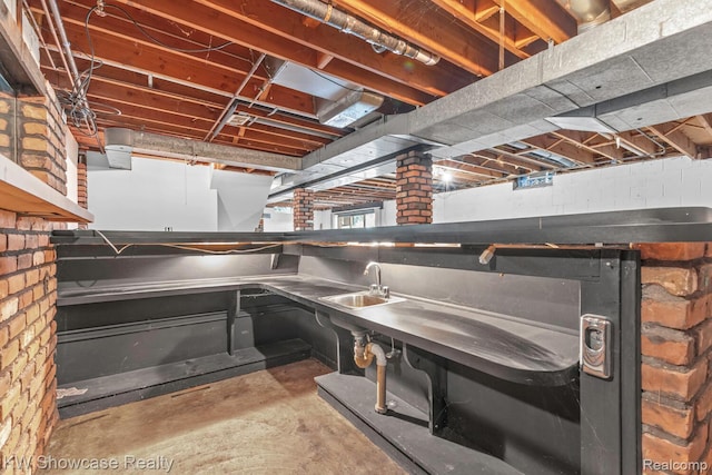 1830 Majon, Highland, MI 48356 - unfinished basement with bar with sink