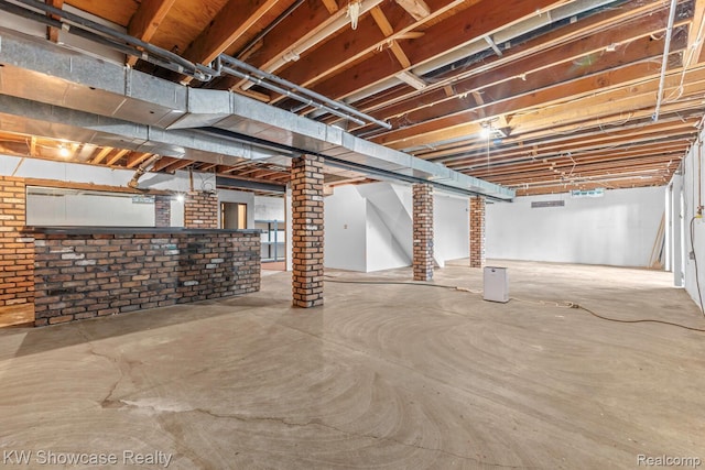 1830 Majon, Highland, MI 48356 - unfinished below grade area featuring brick wall