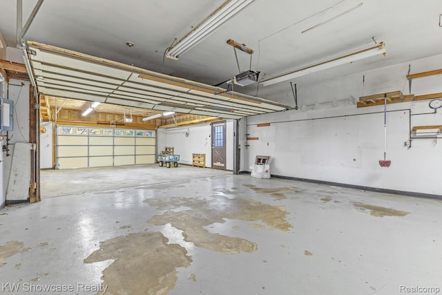 1830 Majon, Highland, MI 48356 - garage with a garage door opener