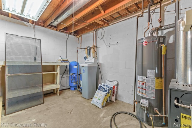 1830 Majon, Highland, MI 48356 - unfinished basement with a water softener, gas water heater, a water pressure tank, and concrete block wall