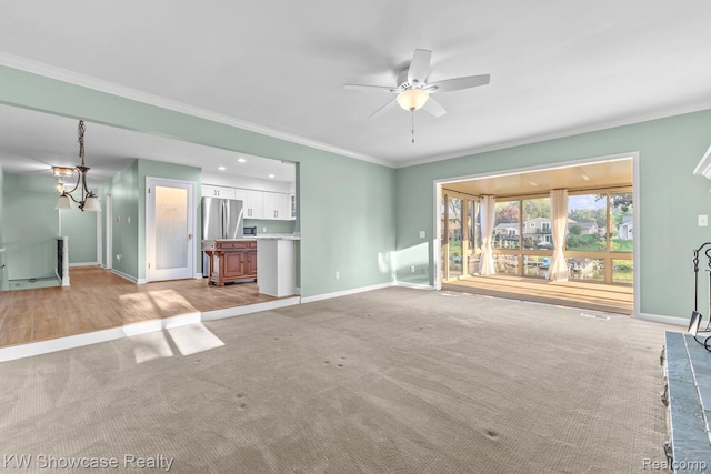 1830 Majon, Highland, MI 48356 - unfurnished living room with ornamental molding, ceiling fan, and light carpet